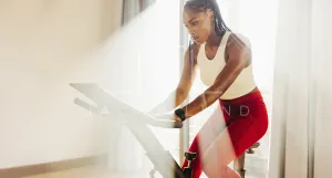 Black female athlete crushes cardio with home workout