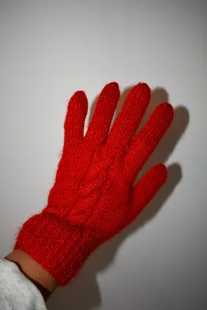 Bright red handknit gloves